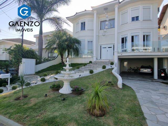 Casa de Condomínio para alugar com 4 quartos, 420m² - Foto 1